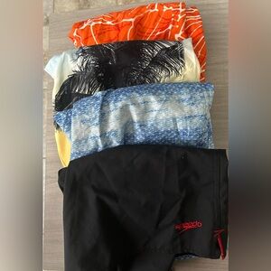 Men’s bundle swimming trunks. All size medium.